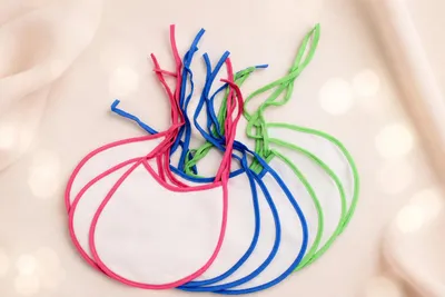 Produktbild von Best For Kids Baby Lätzchen zum Binden aus weichem Frottee, wasserdichte Rückseite, saugstark aus Baumwolle, waschbar, 5er oder 10er Pack, Blau, Rosa, KI-generiertes Bild