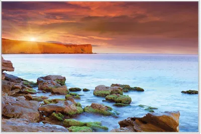 Produktbild von Wallario Wandbild Sonnenaufgang am Meer mit Landzunge und Felsen im Wasser, Größe: 61 x 91,50 cm, Poster mit weißem Aluminiumrahmen