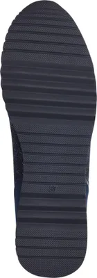 The sole of a blue sneaker is shown against a white background.