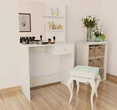 A white vanity table with a mirror and a stool in a room.