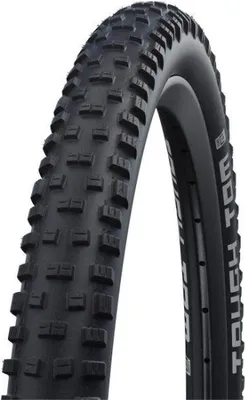 A close-up studio shot of a black bicycle tire.