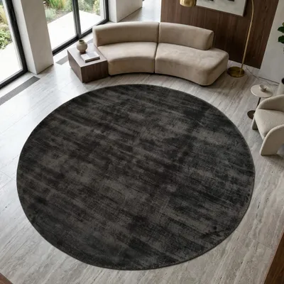 Produktbild von Wohnzimmerteppich Unidesign Handgefertigt in schwarz Größe - 160 cm Rund