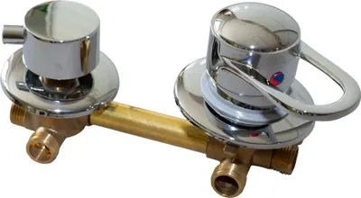 A chrome and brass shower faucet with a diverter.