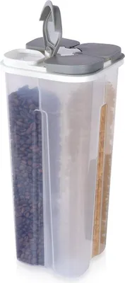 A transparent multi-compartment food storage container with a gray lid and handle, filled with different dry goods.