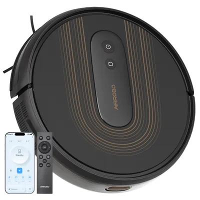 A black robot vacuum cleaner is shown with a smartphone and a remote control.