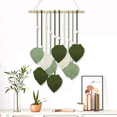 Image de Ibenzoa® Tenture murale bohème en macramé, en coton avec des perles en bois et des feuilles, 85 cm x 40 cm – Décoration murale pour salon et chambre