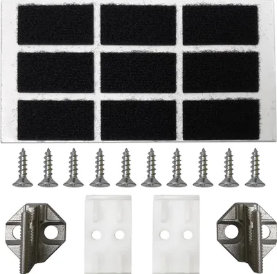 A collection of dishwasher door mounting hardware, including screws, brackets, and plastic guides, laid out on a white background.