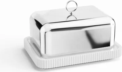 A silver butter dish with a white base is shown against a white background.