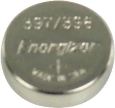 A close-up, top-down view of a silver coin-cell battery.