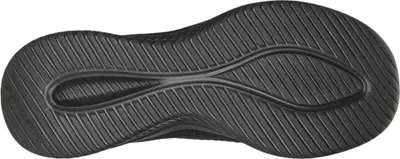 The sole of a black sneaker is shown from an underneath view.