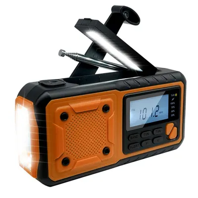 A portable emergency radio with a flashlight and LED light.