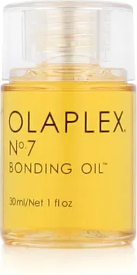 A close-up studio shot of an Olaplex No. 7 Bonding Oil bottle against a white background.