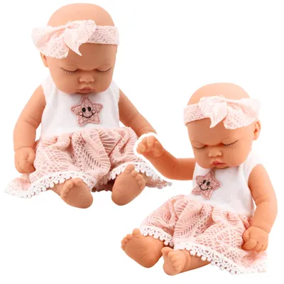 Image de Robe en dentelle rose pour poupée endormie avec bandeau étoile