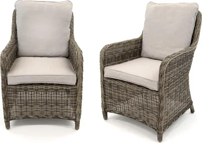 Two gray wicker armchairs with beige cushions are shown against a white background.