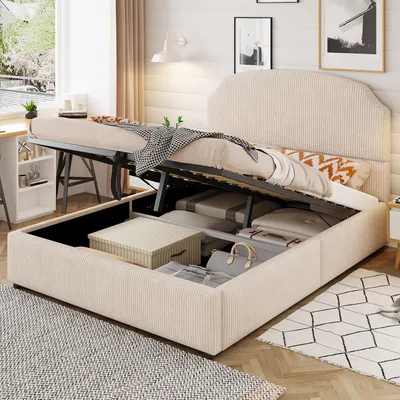 A bed with its storage compartment open, revealing stored items, in a bedroom setting.