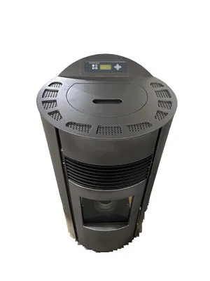 A top-down view of a dark gray pellet stove against a white background.
