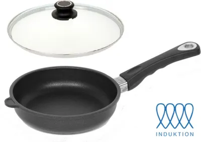 A frying pan and its lid are displayed against a white background.