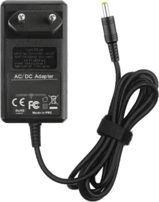 A black AC/DC adapter with a coiled black cord and a yellow connector tip is shown against a white background.