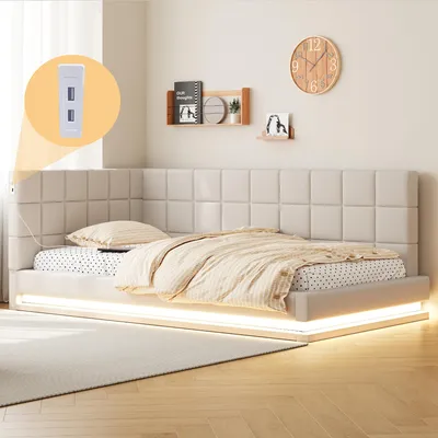 A bedroom scene featuring a bed with a tufted headboard and LED lighting around the base. Decorative items are on the wall above the headboard.