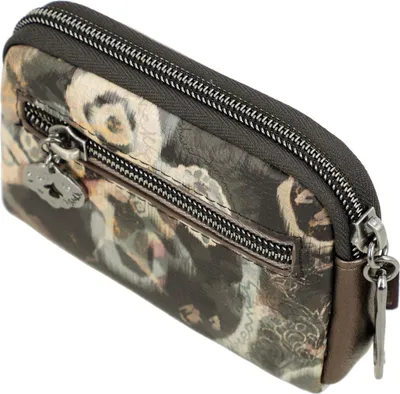 A close-up, angled view of a small, patterned pouch with zippers.