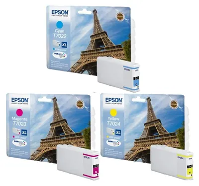 Three Epson ink cartridges in their packaging, each featuring a picture of the Eiffel Tower.