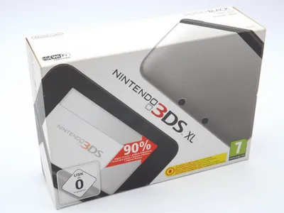 The image shows the retail packaging of a Nintendo 3DS XL handheld game console.