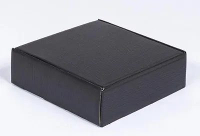 A black cardboard box on a white background.