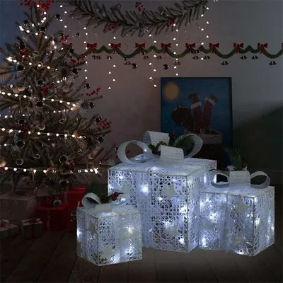 Christmas decorations including a tree, garland, and illuminated gift boxes.