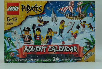 The image shows the front of a LEGO Pirates Advent Calendar box, featuring various pirate-themed minifigures and a ship in a snowy setting.