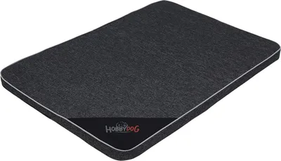 A dark gray dog mattress with a black label and white trim, shown from a slightly elevated angle on a white background.
