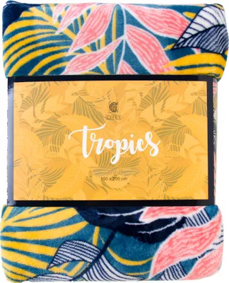 A folded blanket with a tropical leaf pattern is shown, with its packaging in the center.