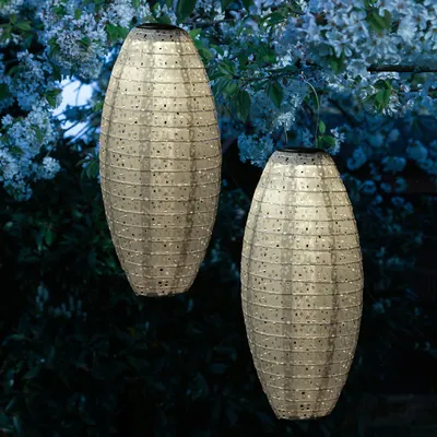 Produktbild von LED Solar Lampions oval - mit Blumenmuster - warmweiß - H: 40cm - Lichtsensor - beige - 2 Stück