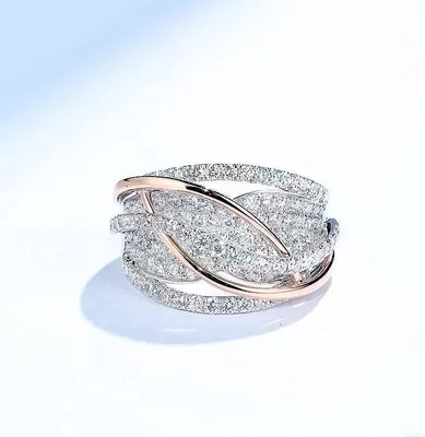 Produktbild von Bicolor Damenring mit Zirkonia – Mehrreihiges Kreuzdesign – Breiter Wellenring, J0756