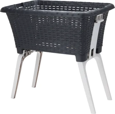 A dark gray laundry basket with white legs is shown against a white background.