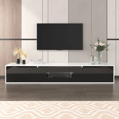 Produktbild von TV-Schrank Hochglänzender im Colour-Blocking-Design mehrere Stauräume schwarzes Rillendesign LED Schwarz und weiß