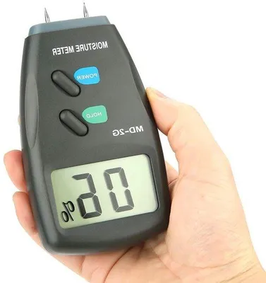 Obrázek produktu pro Průměrný vlhkoměr 5–40 % – digitální ruční vlhkoměr s LCD displejem, modrý přístroj.