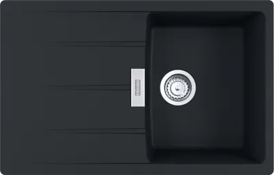 A top-down view of a black kitchen sink with a silver drain.