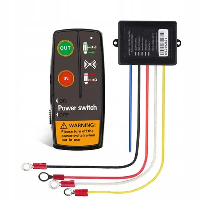 A wireless remote control and receiver for a winch, with wires and connectors.