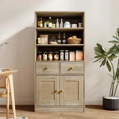 A wooden storage cabinet with multiple shelves, drawers, and doors, filled with various food items and decorative objects.