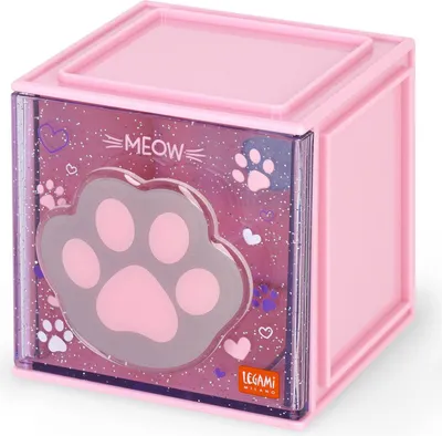 A pink cube-shaped desk organizer with a transparent front featuring a cat paw print and glitter.