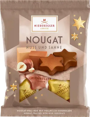 Zdjęcie produktu dla Niederegger orzechowo-śmietankowe gwiazdki nugatowe w torebce z pełnego mleka 87g