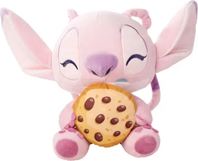 A pink plush toy of a character holding a cookie.