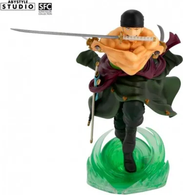 A figurine of the anime character Roronoa Zoro from One Piece, depicted in a dynamic action pose with his swords.