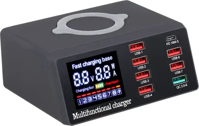 A black multifunctional charger with multiple USB ports and a digital display.