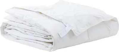 A folded white duvet on a white background.