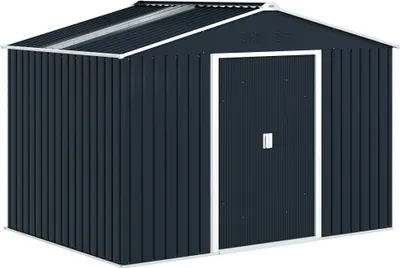 A dark gray metal shed with a pitched roof and a double door.
