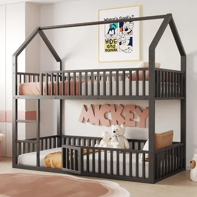 A children's bunk bed with a house-like frame, decorated with Mickey Mouse themed wall art.