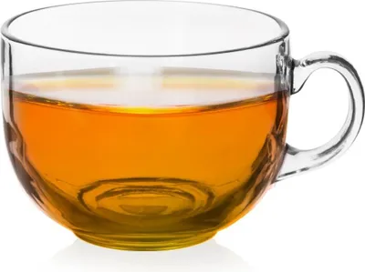A clear glass mug filled with amber-colored liquid, likely tea or coffee, against a white background.
