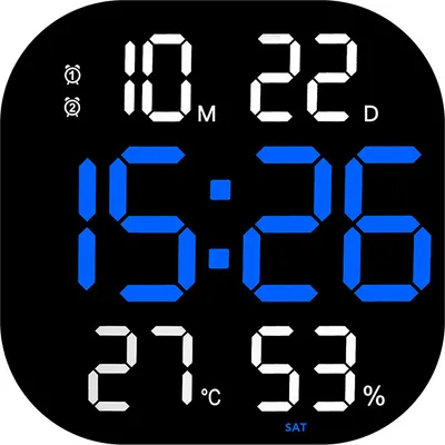 A digital clock display showing time, date, temperature, and humidity.