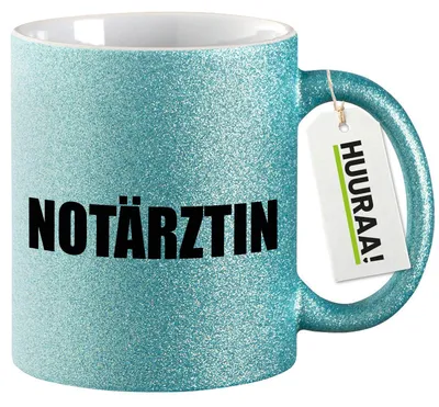 Produktbild von Huuraa Glitzertasse Notärztin Schriftzug 330ml Blau Keramik Kaffeebecher Geschenkidee